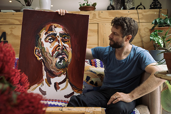 Ben Quilty with painting by Myuran Sukumaran