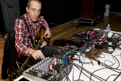 Oren Ambarchi, performing as part of Noise Duo